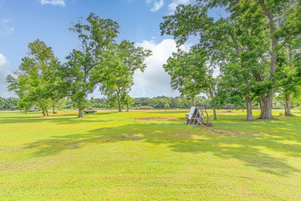 4294 Brazos River Road, Unit CR400 Freeport, TX 77541 - Photo 5 of 50 a view of swimming pool with an outdoor space and seating area