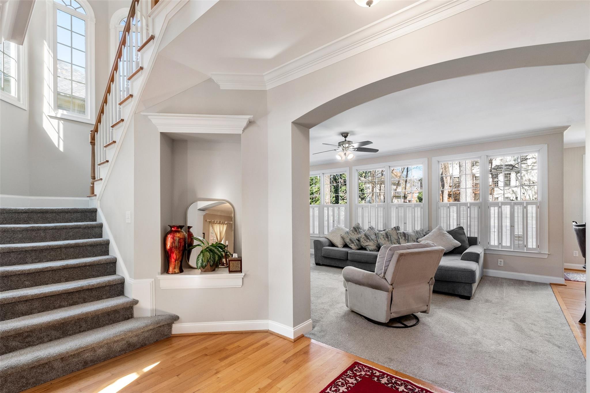 3519 Rhett Butler Place Charlotte, NC 28270 - Photo 11 of 38 a living room with furniture and a floor to ceiling window
