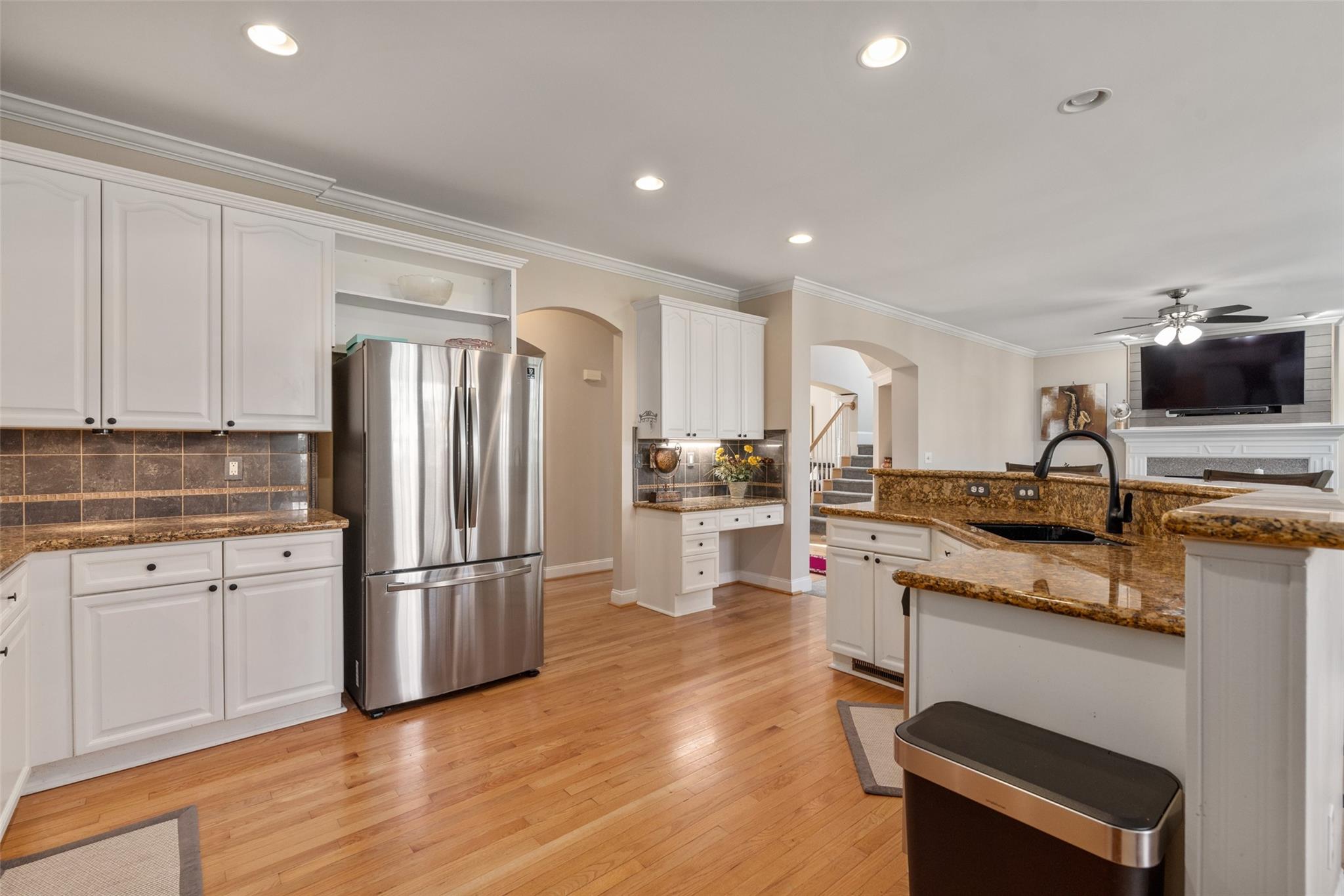 3519 Rhett Butler Place Charlotte, NC 28270 - Photo 15 of 38 a kitchen with a refrigerator and a stove top oven