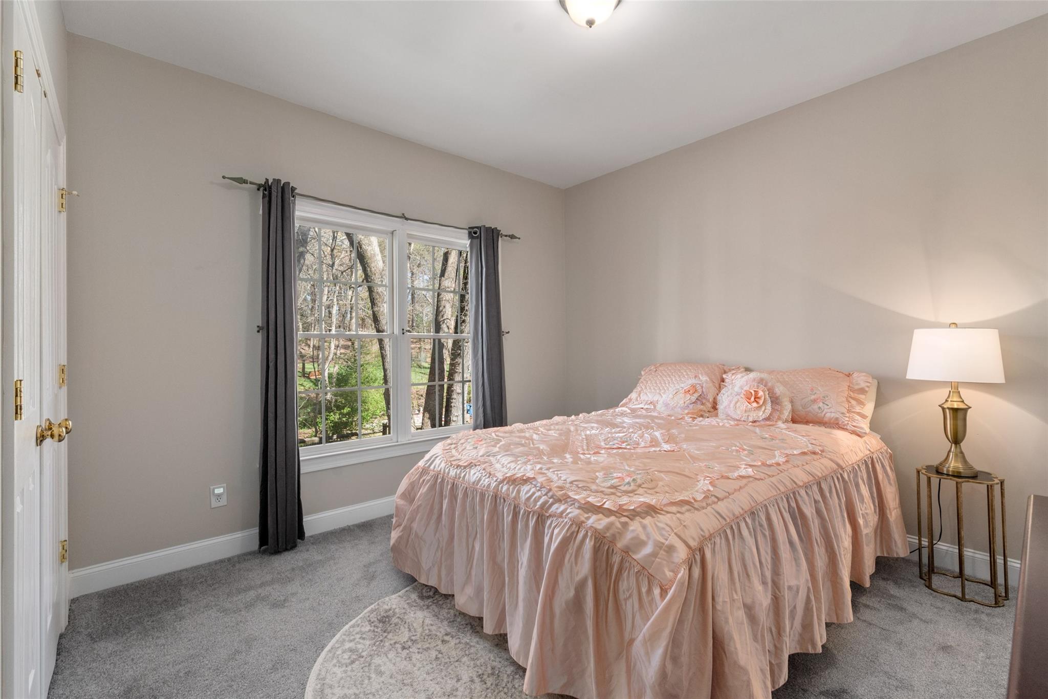 3519 Rhett Butler Place Charlotte, NC 28270 - Photo 19 of 38 a bedroom with a bed and a window