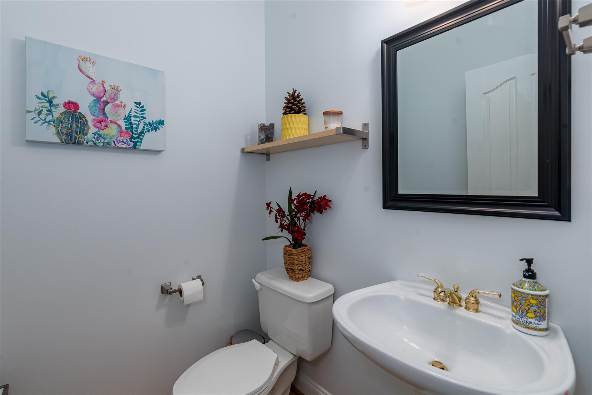 3519 Rhett Butler Place Charlotte, NC 28270 - Photo 20 of 38 a bathroom with a sink mirror and toilet