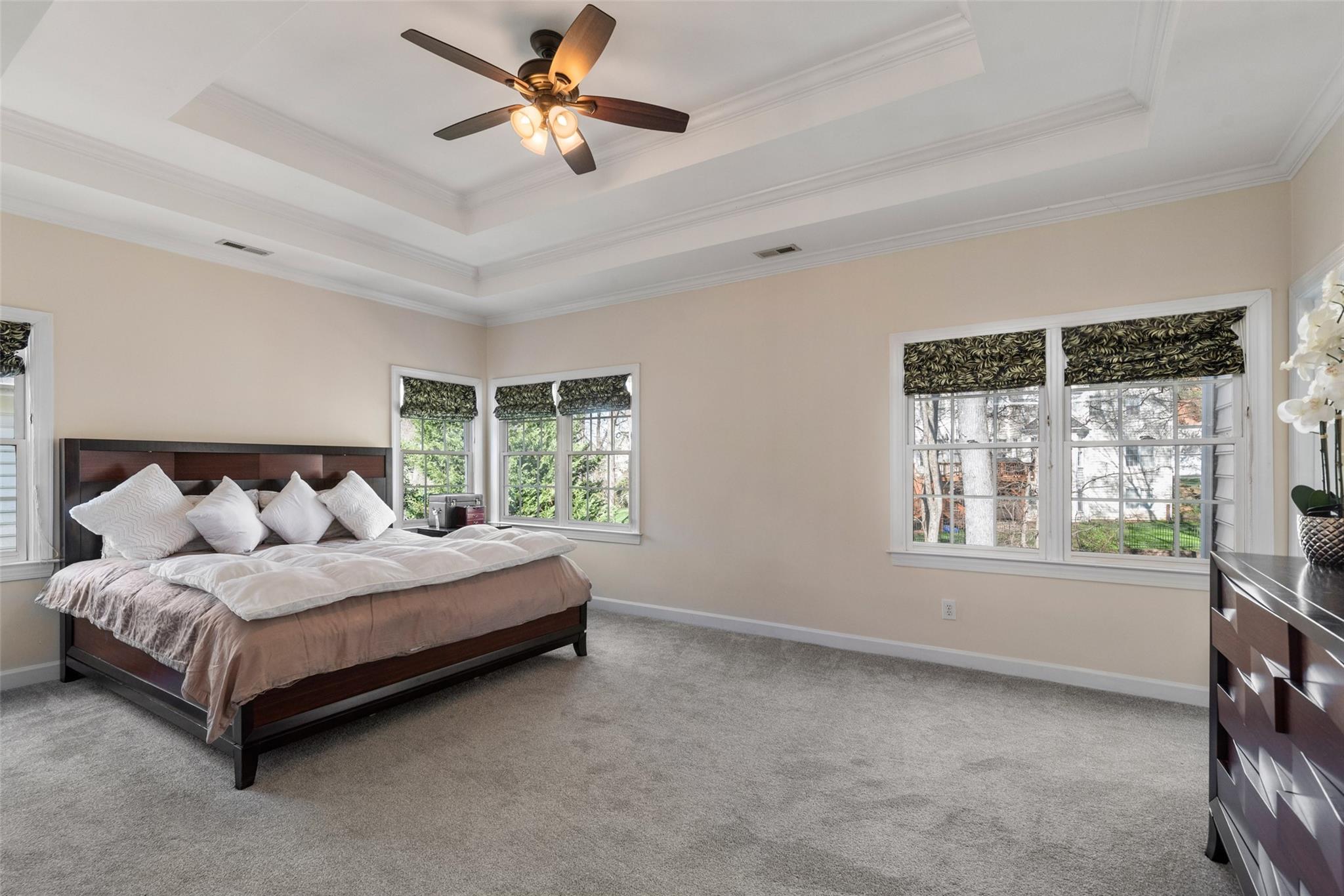 3519 Rhett Butler Place Charlotte, NC 28270 - Photo 22 of 38 a spacious bedroom with a bed and a large window