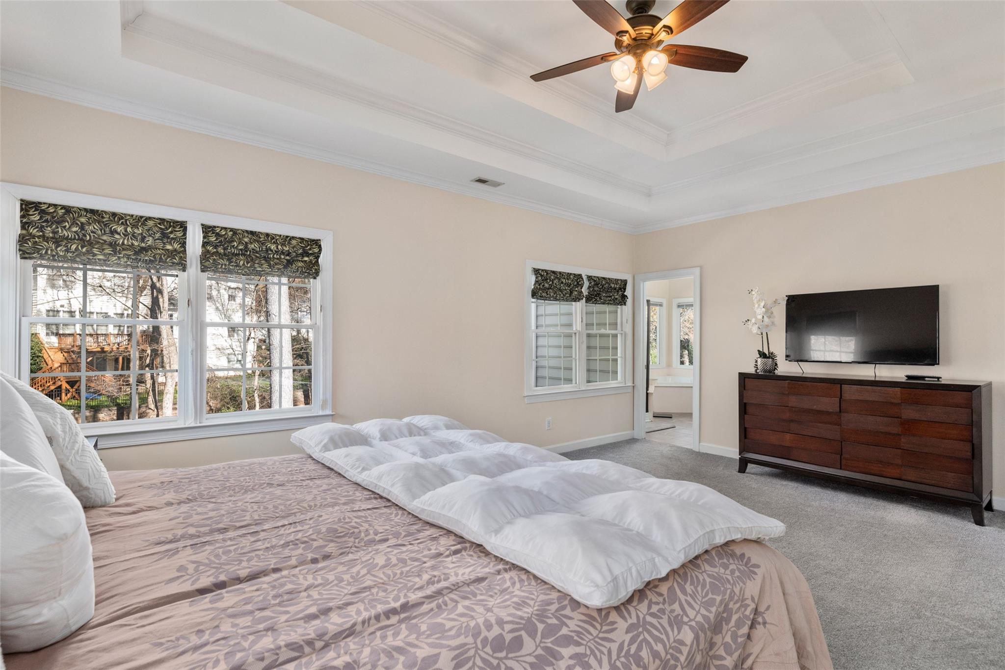 3519 Rhett Butler Place Charlotte, NC 28270 - Photo 23 of 38 a bedroom with a bed and a television