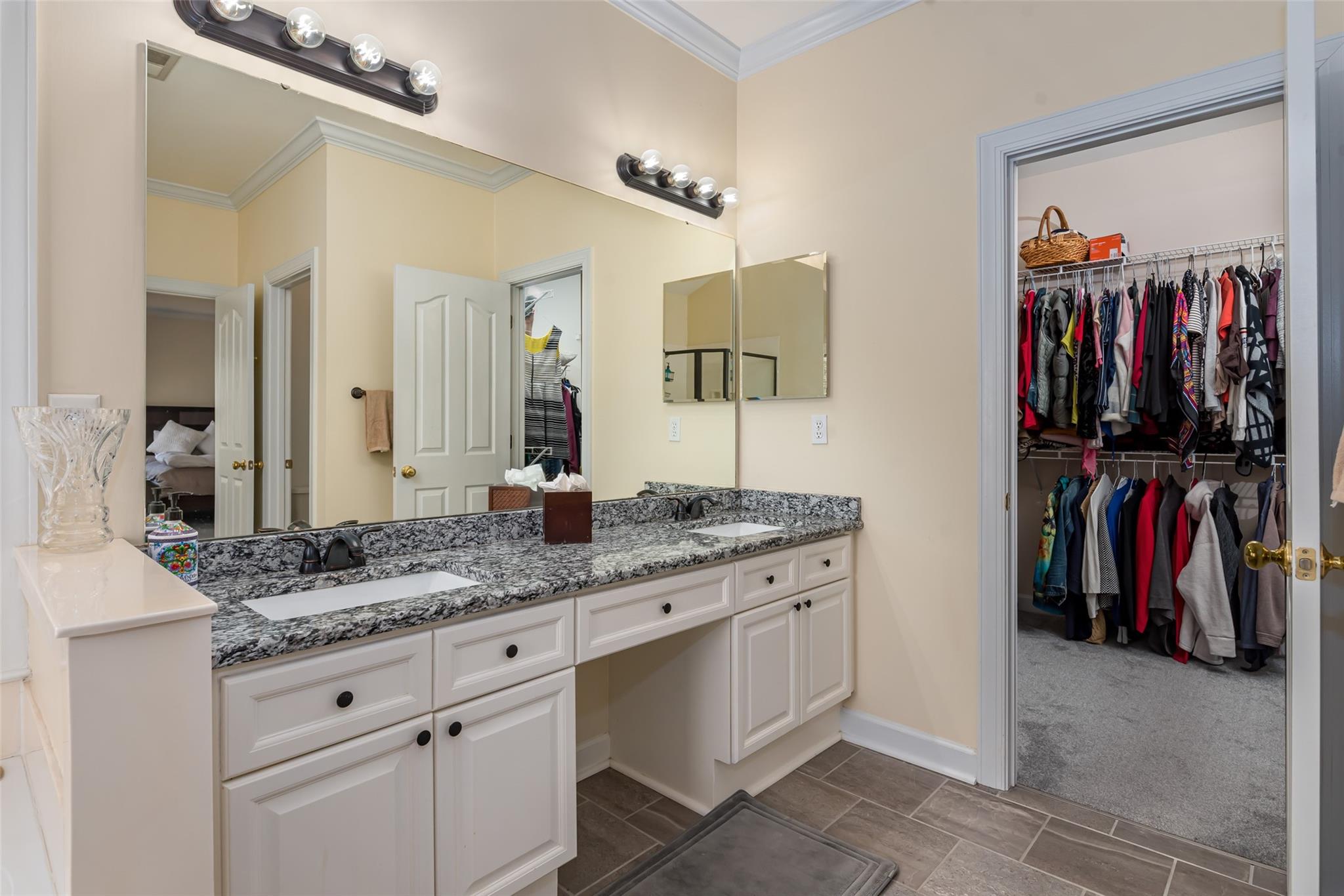 3519 Rhett Butler Place Charlotte, NC 28270 - Photo 25 of 38 a bathroom with a sink and a mirror