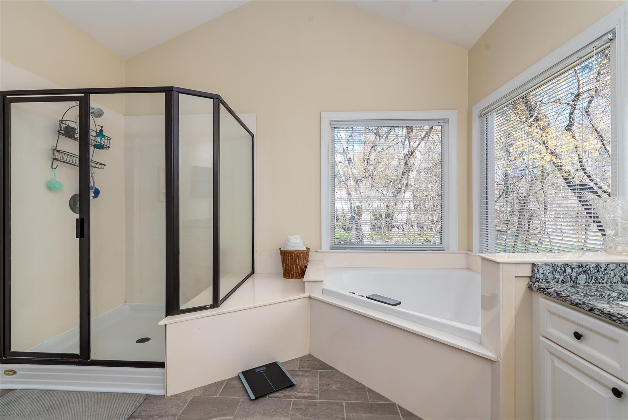 3519 Rhett Butler Place Charlotte, NC 28270 - Photo 26 of 38 a bathroom with a bathtub and a shower