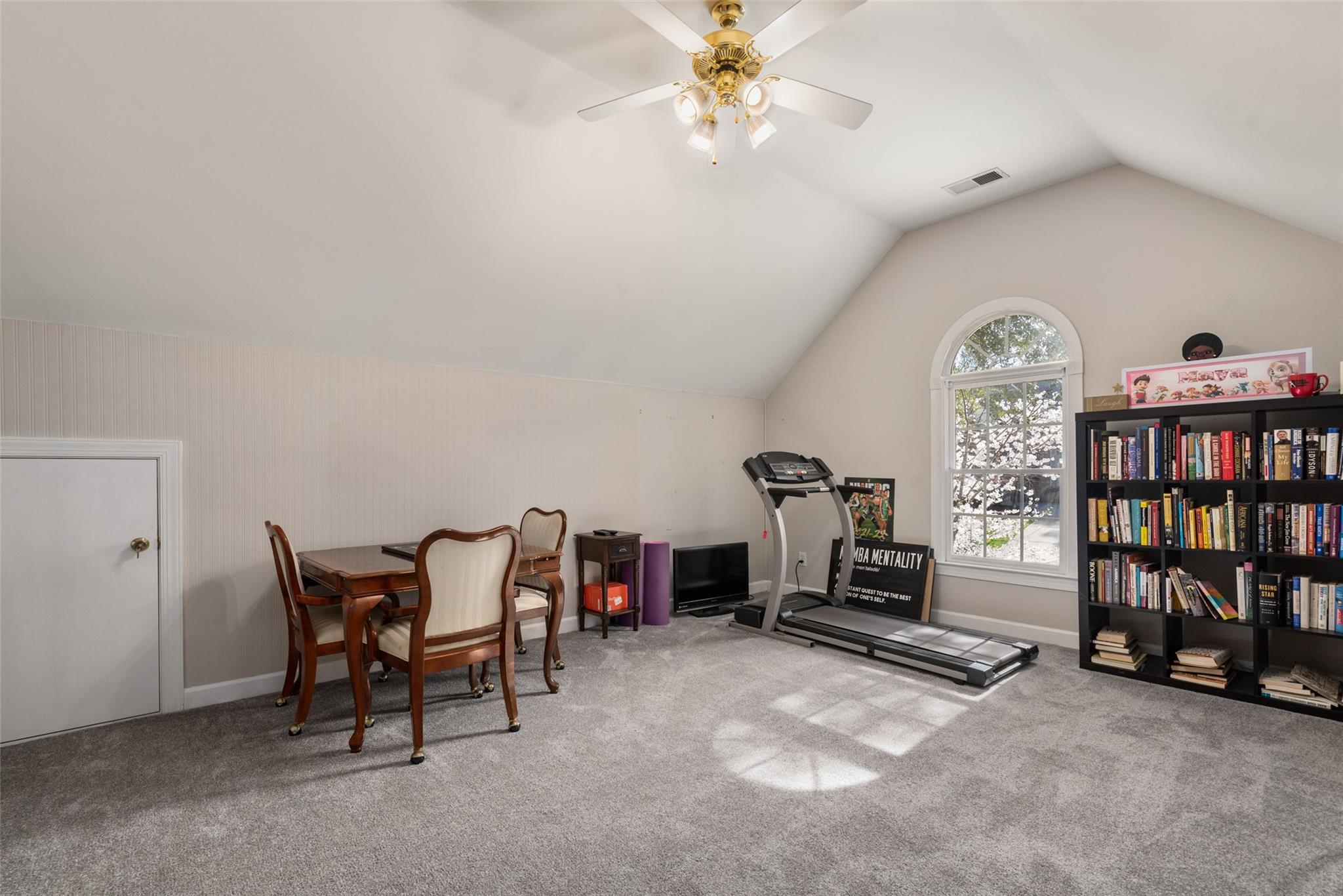 3519 Rhett Butler Place Charlotte, NC 28270 - Photo 31 of 38 a view of a workspace with furniture and a bookshelf