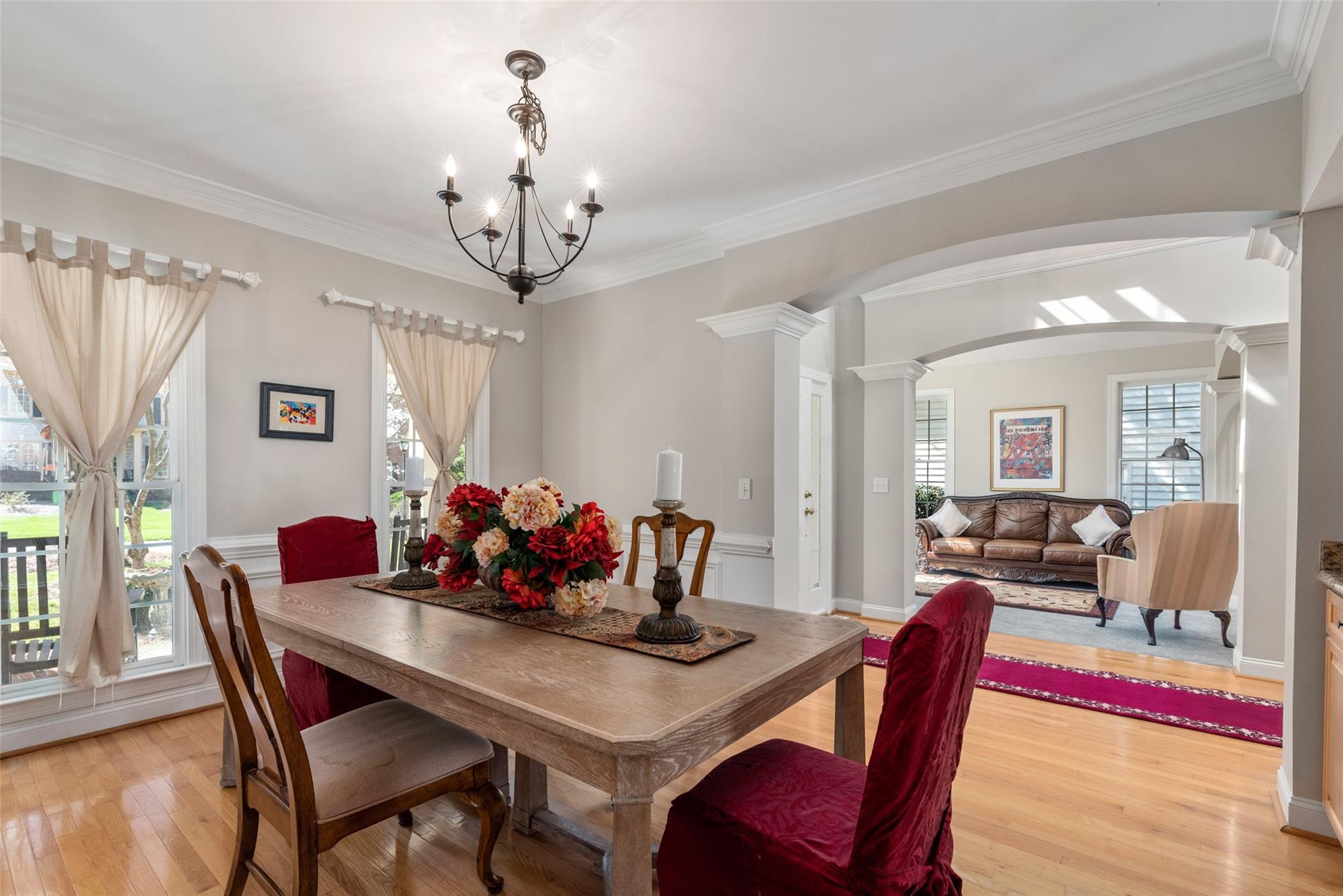 3519 Rhett Butler Place Charlotte, NC 28270 - Photo 10 of 38 a view of a dining room with furniture window and wooden floor