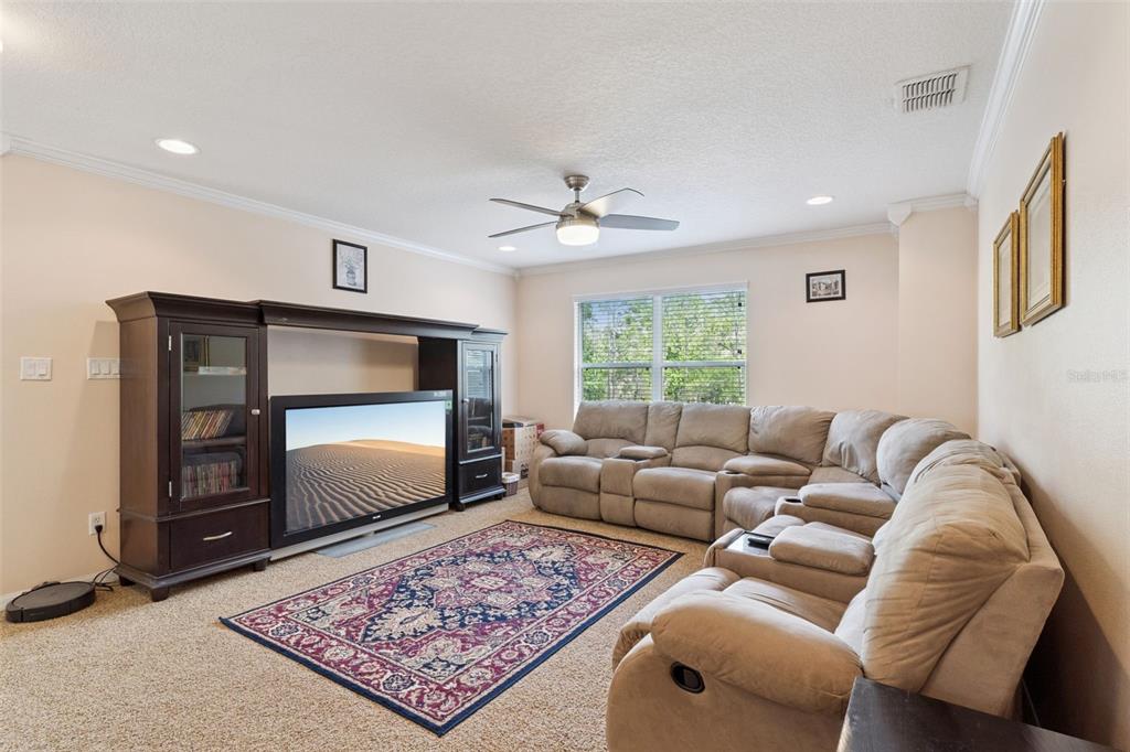 14790 Tullamore Loop Winter Garden, FL 34787 - Photo 19 of 42 a living room with furniture and a window