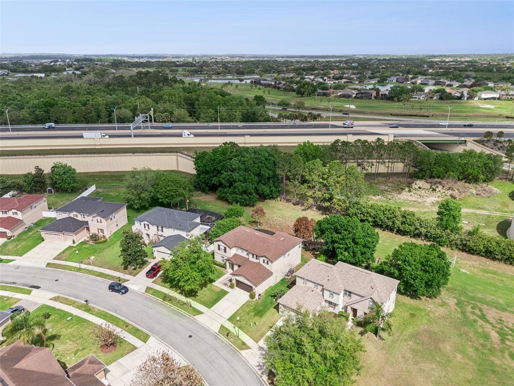 14790 Tullamore Loop Winter Garden, FL 34787 - Photo 41 of 42 an aerial view of a city with lots of residential buildings