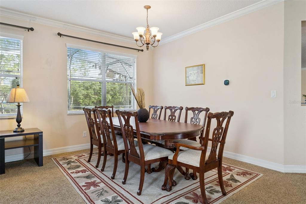 14790 Tullamore Loop Winter Garden, FL 34787 - Photo 7 of 42 a view of a dining room with furniture window and outside view