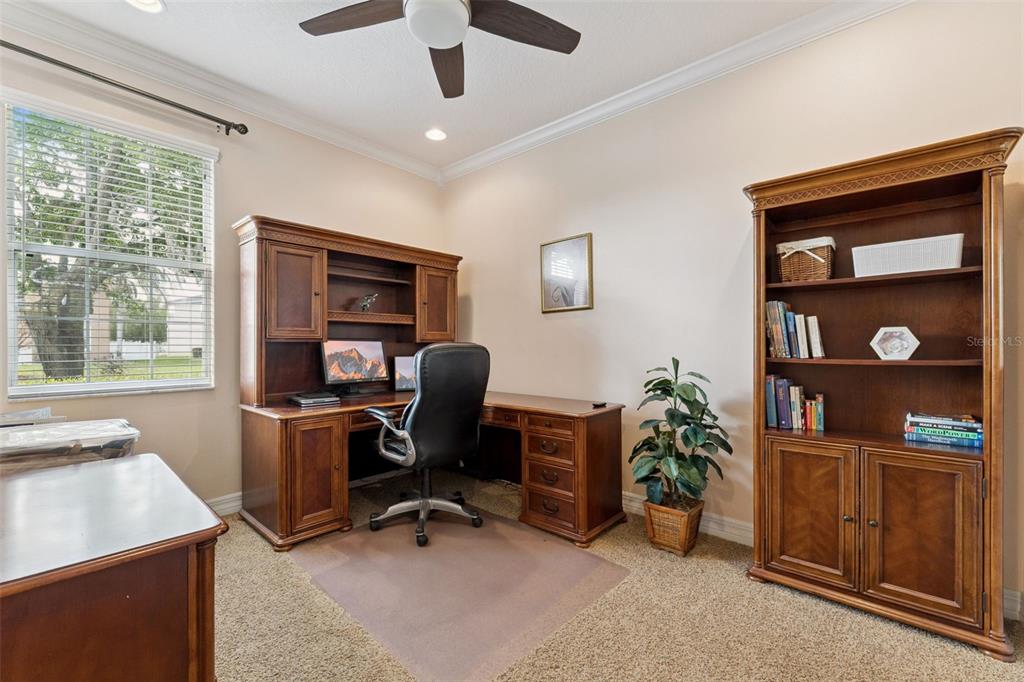 14790 Tullamore Loop Winter Garden, FL 34787 - Photo 8 of 42 a view of a workspace with furniture and a window