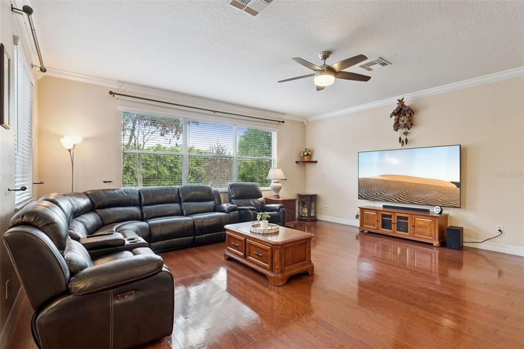 14790 Tullamore Loop Winter Garden, FL 34787 - Photo 10 of 42 a living room with furniture and a flat screen tv