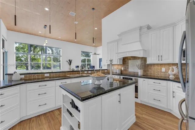 a bathroom with a sink a mirror and a toilet