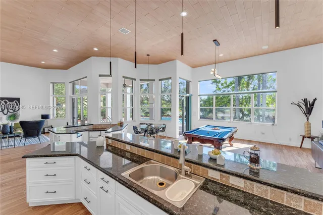 a bathroom with a shower and a mirror