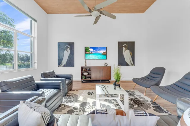 a front view of a house with a yard and a garage