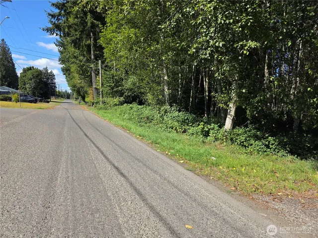 a view of swimming pool with a yard