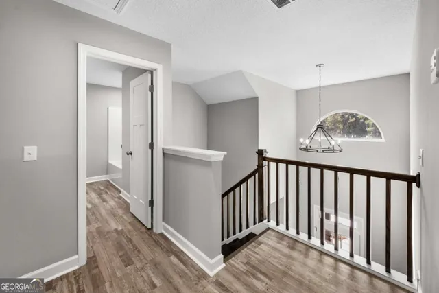 a view of a hallway with entryway