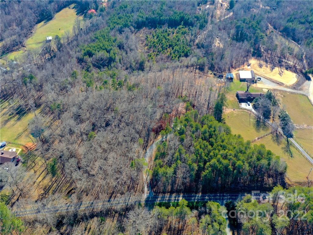 5 Riva Ridge Lane Columbus, NC 28722 - Photo 5 of 12 a backyard of a house with lots of green space