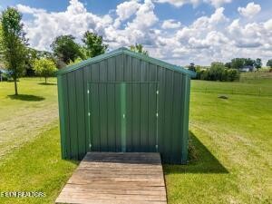 338 Pistole Road Sparta, TN 38583 - Photo 39 of 39 a backyard of a house with lots of green space