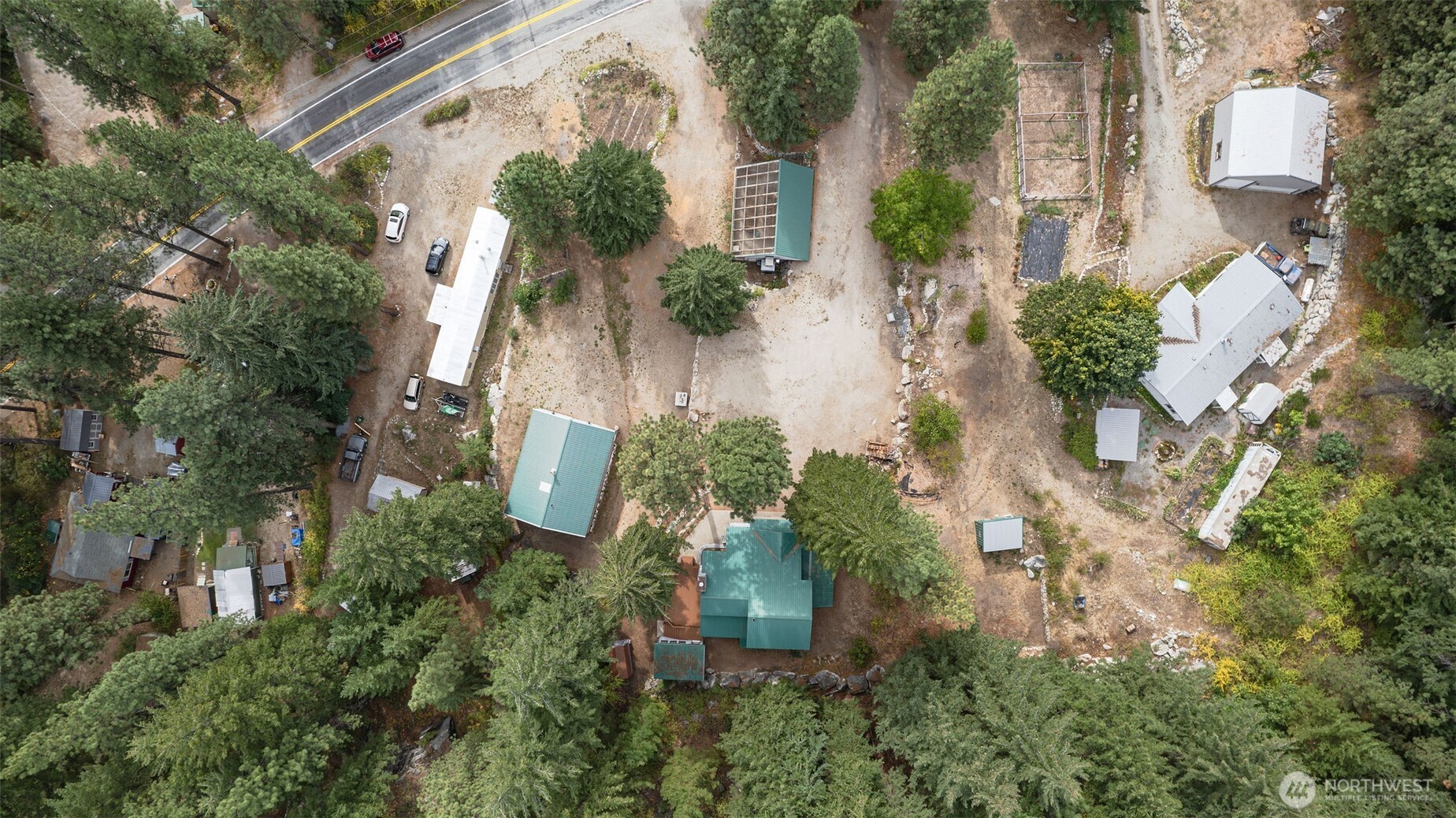17972 Entiat River Road Entiat, WA 98822 - Photo 27 of 34 an aerial view of a house with a yard and large trees