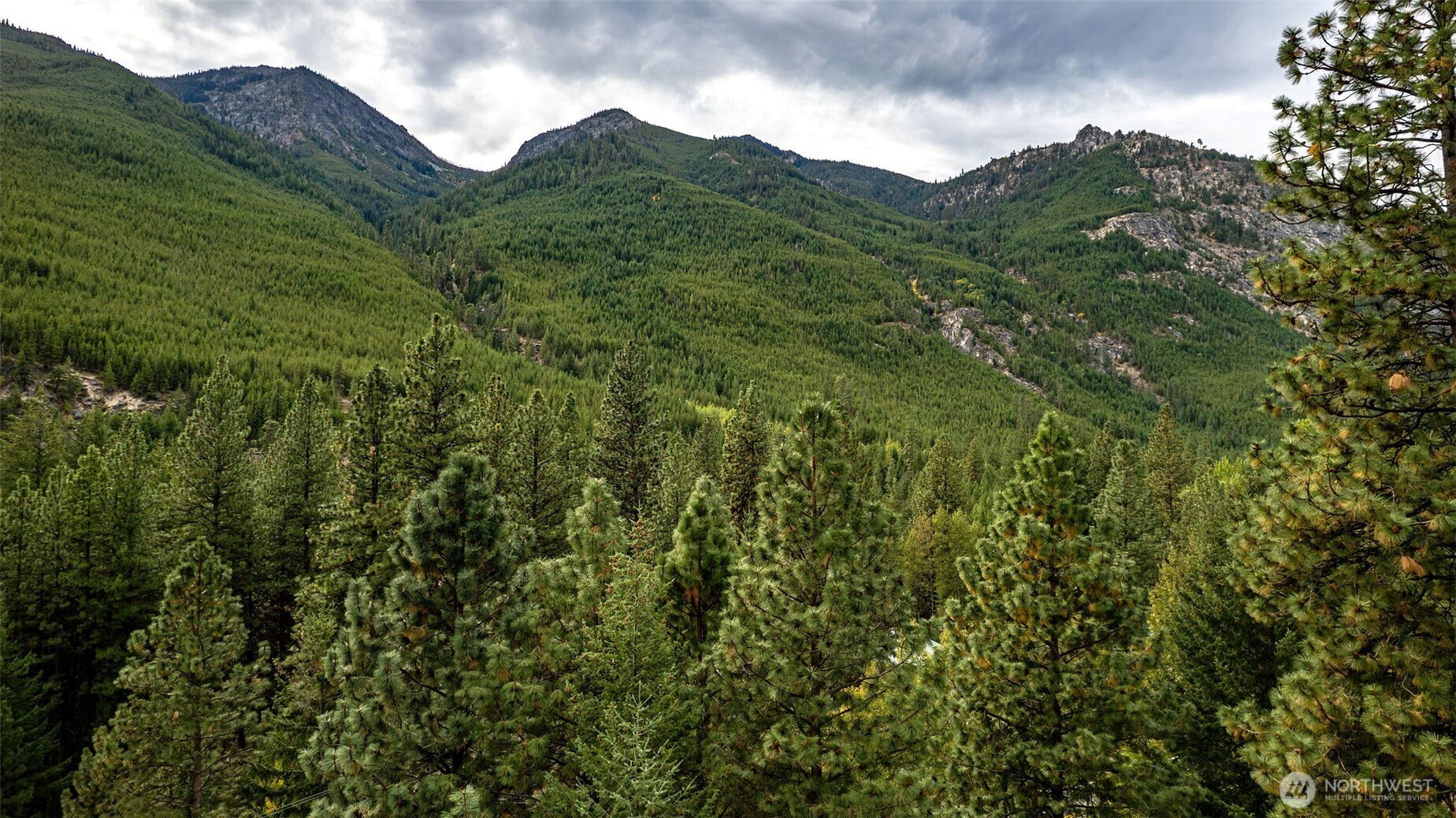 17972 Entiat River Road Entiat, WA 98822 - Photo 34 of 34 a view of a large mountain with mountains in the background
