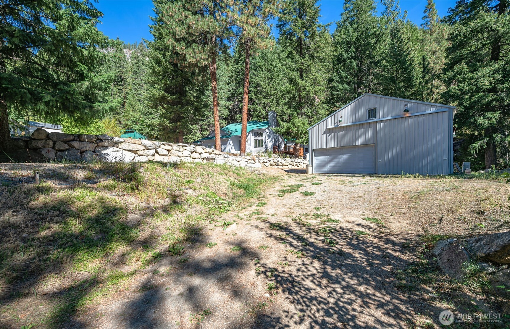 17972 Entiat River Road Entiat, WA 98822 - Photo 4 of 34 a backyard of a house