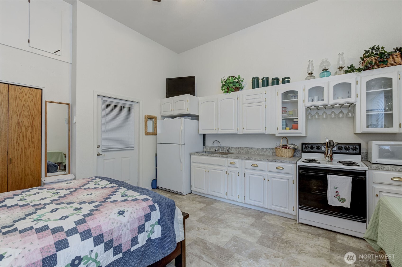 17972 Entiat River Road Entiat, WA 98822 - Photo 5 of 34 a spacious bedroom with a bed and a cabinets