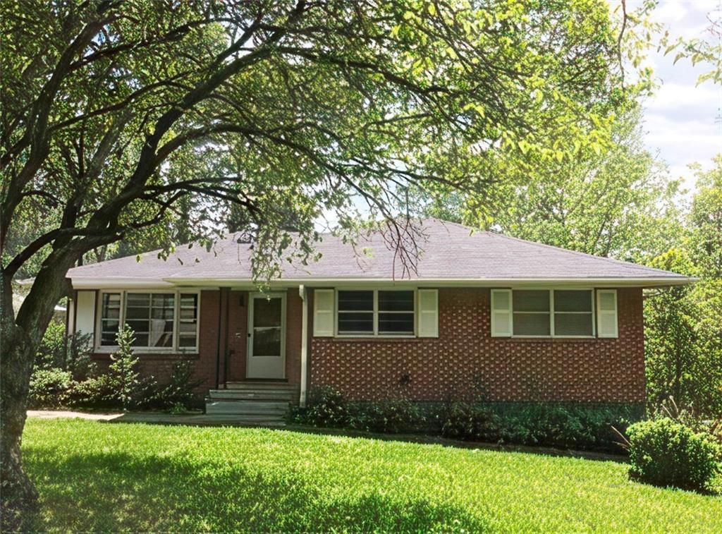 677 Shellnut Drive Forest Park, GA 30297 - Photo 1 of 1 a view of front of a house with a yard