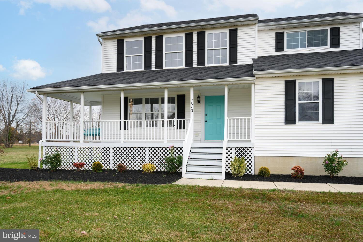 119 Wye Knot Road Queenstown, MD 21658 - Photo 12 of 45 a front view of a house with a garden