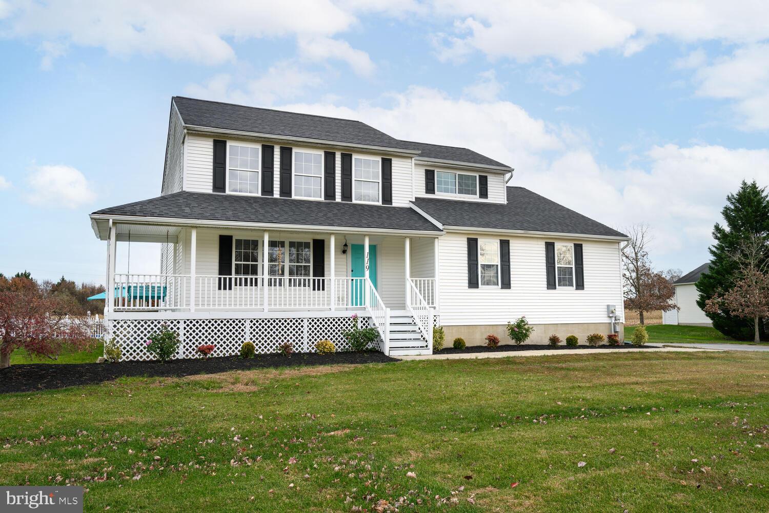 119 Wye Knot Road Queenstown, MD 21658 - Photo 2 of 45 a front view of a house with a yard