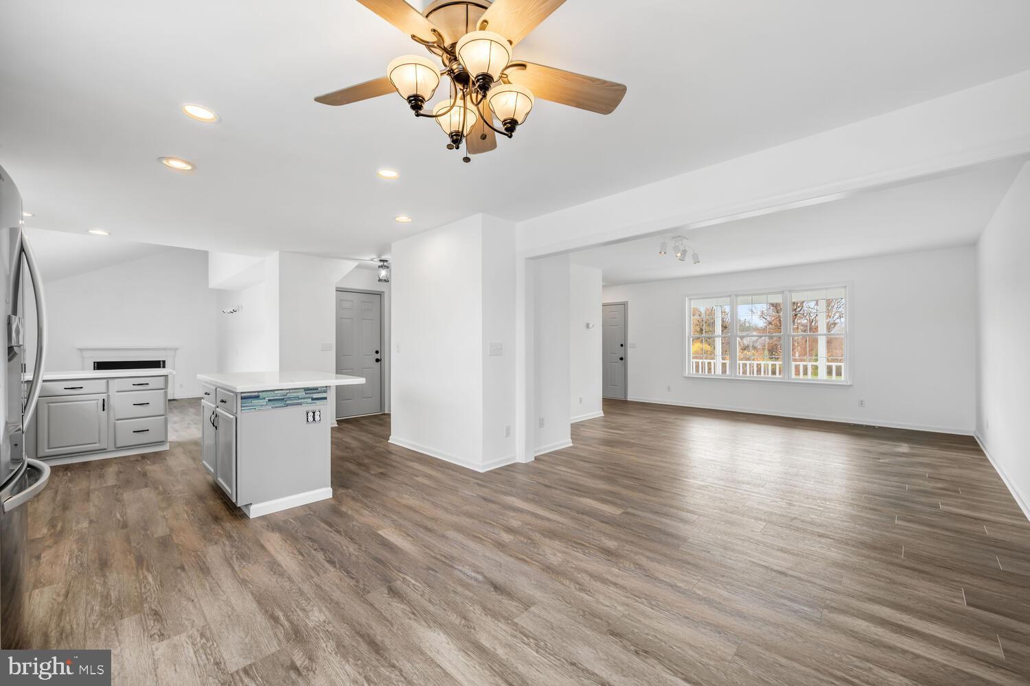 119 Wye Knot Road Queenstown, MD 21658 - Photo 22 of 45 a view of a kitchen with a kitchen counter space a sink appliances and cabinets