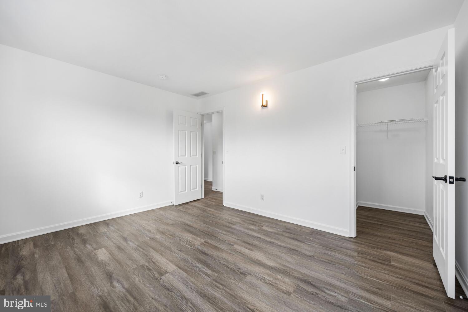 119 Wye Knot Road Queenstown, MD 21658 - Photo 36 of 45 a view of an empty room with wooden floor
