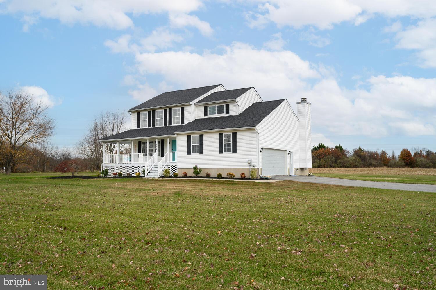 119 Wye Knot Road Queenstown, MD 21658 - Photo 4 of 45 a front view of a house with a garden