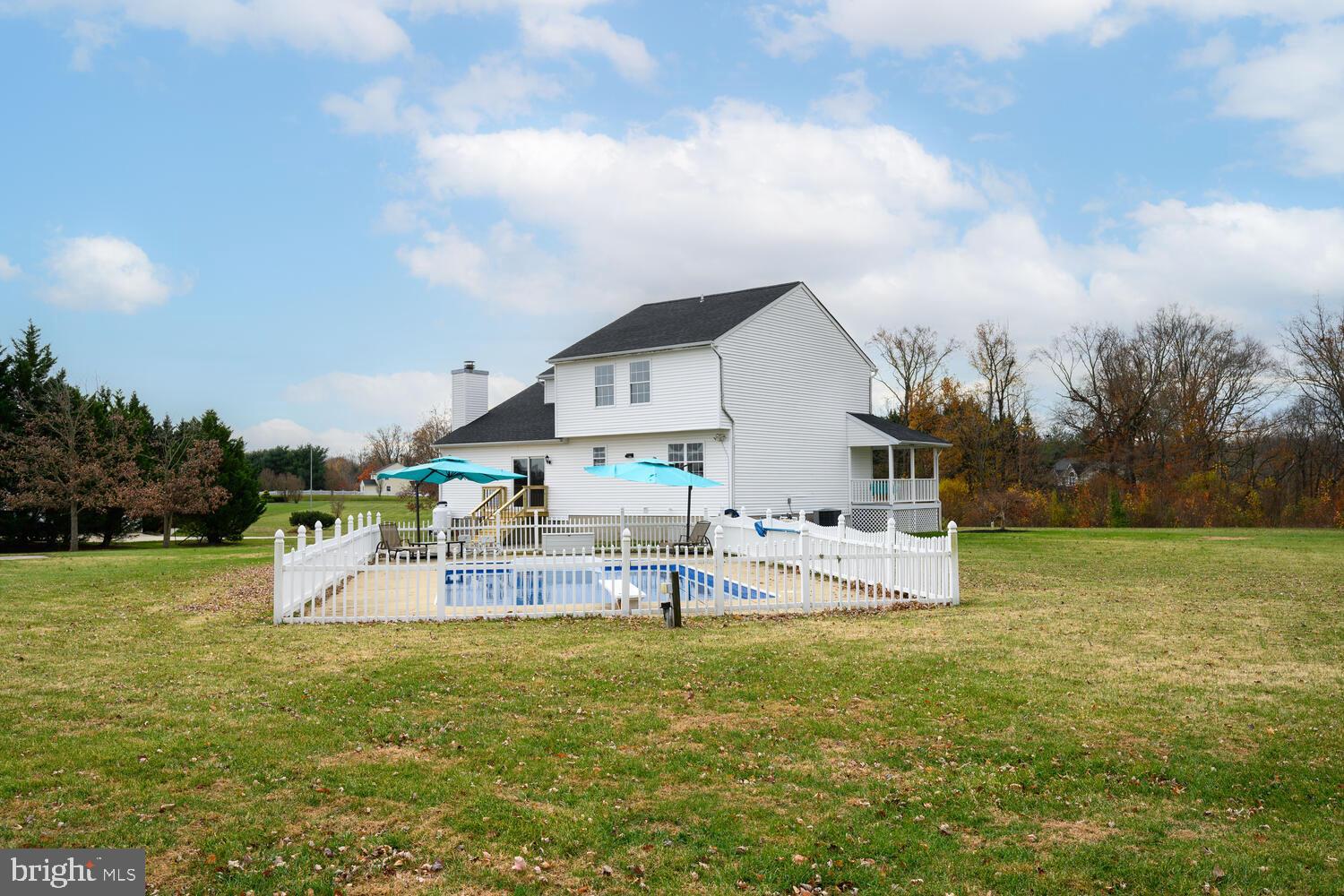 119 Wye Knot Road Queenstown, MD 21658 - Photo 6 of 45 a view of house with outdoor space and swimming pool