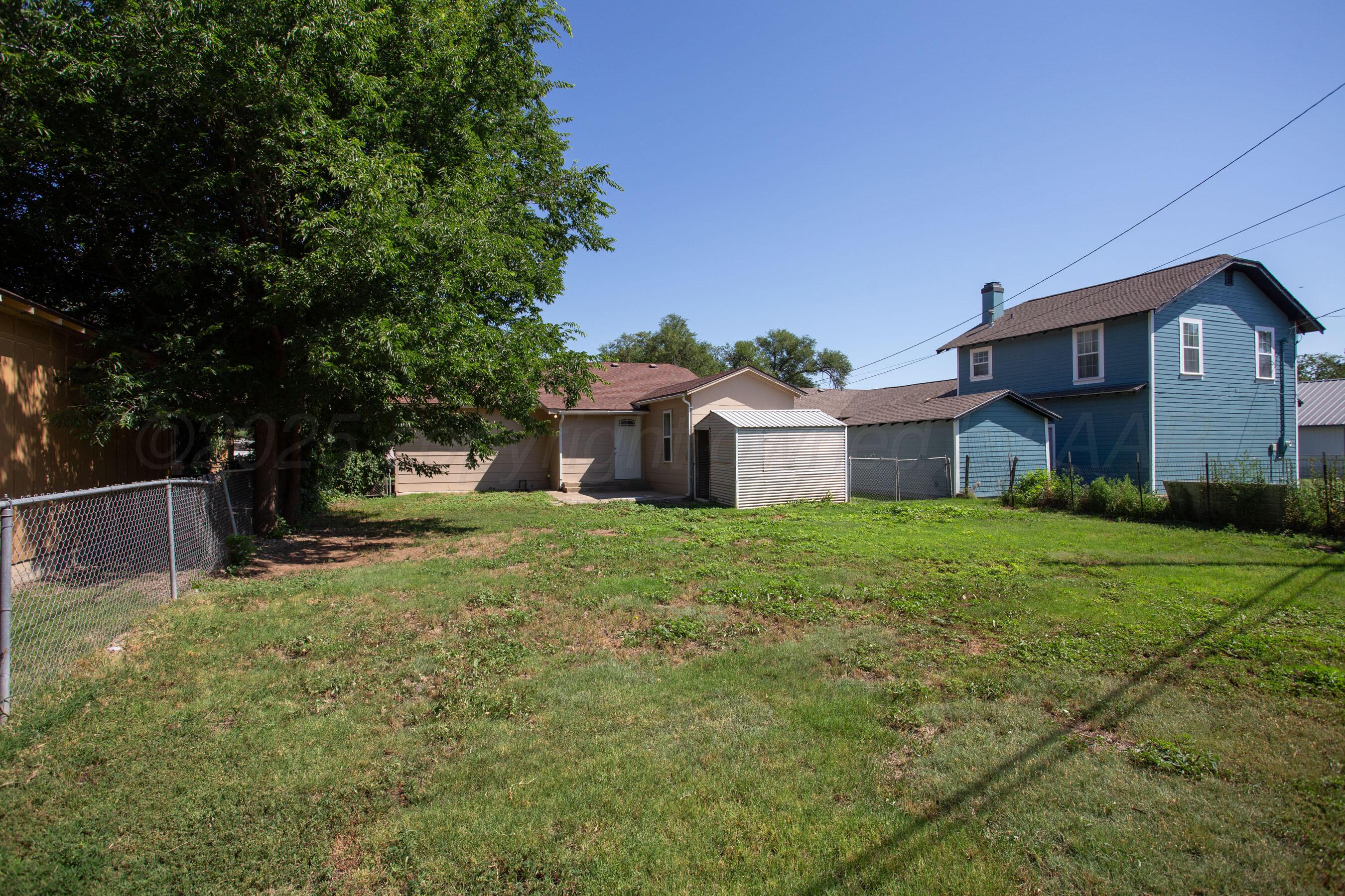 406 Sunset Terrace Amarillo, TX 79106 - Photo 24 of 25 a house view with a garden space