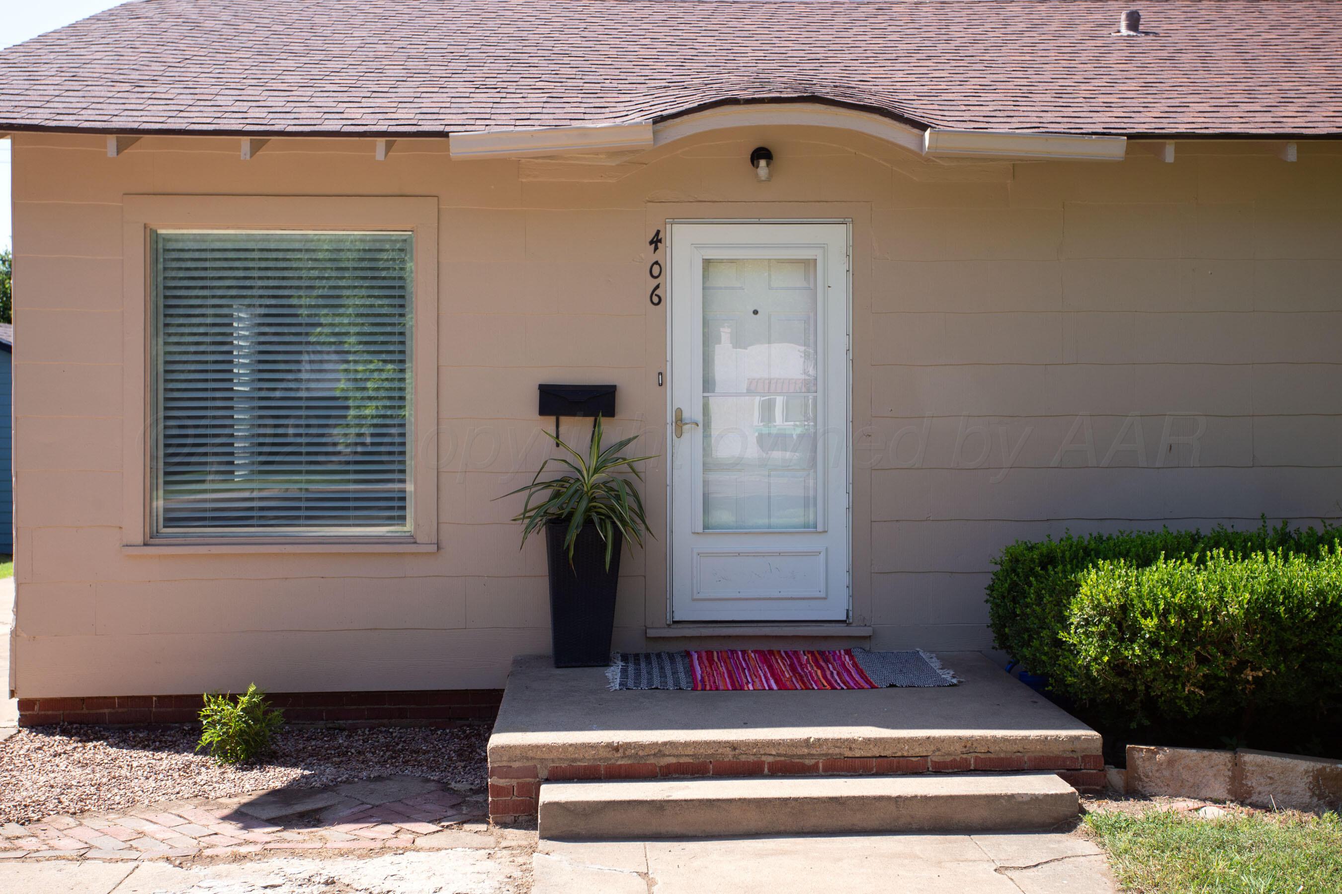 406 Sunset Terrace Amarillo, TX 79106 - Photo 3 of 25 a front view of a house with potted plants