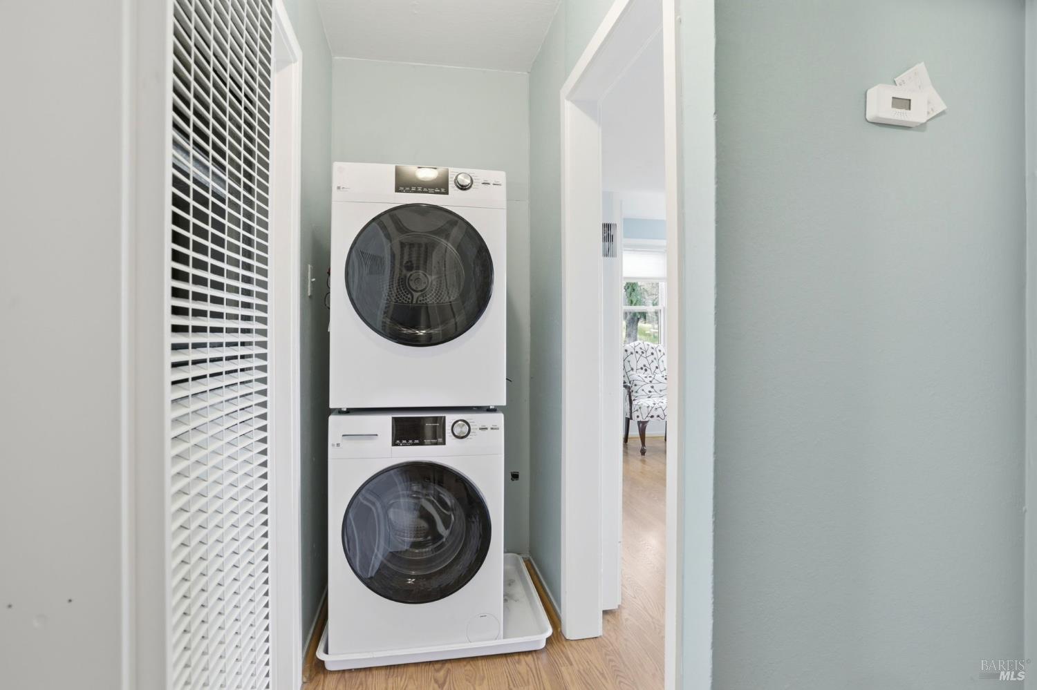 49 Livingston Court Novato, CA 94949 - Photo 14 of 21 Stacked washer dryer in hallway