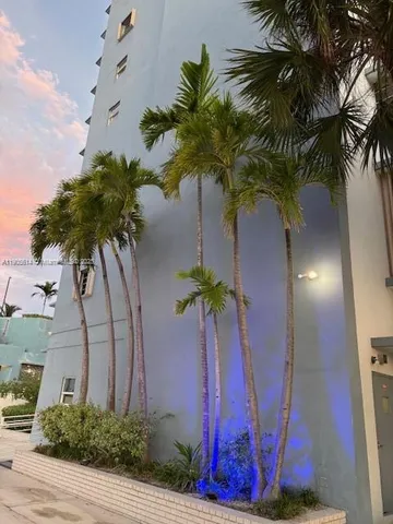 an outdoor view from a dining room with balcony