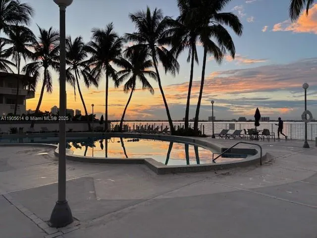 a view of a lake and outdoor space