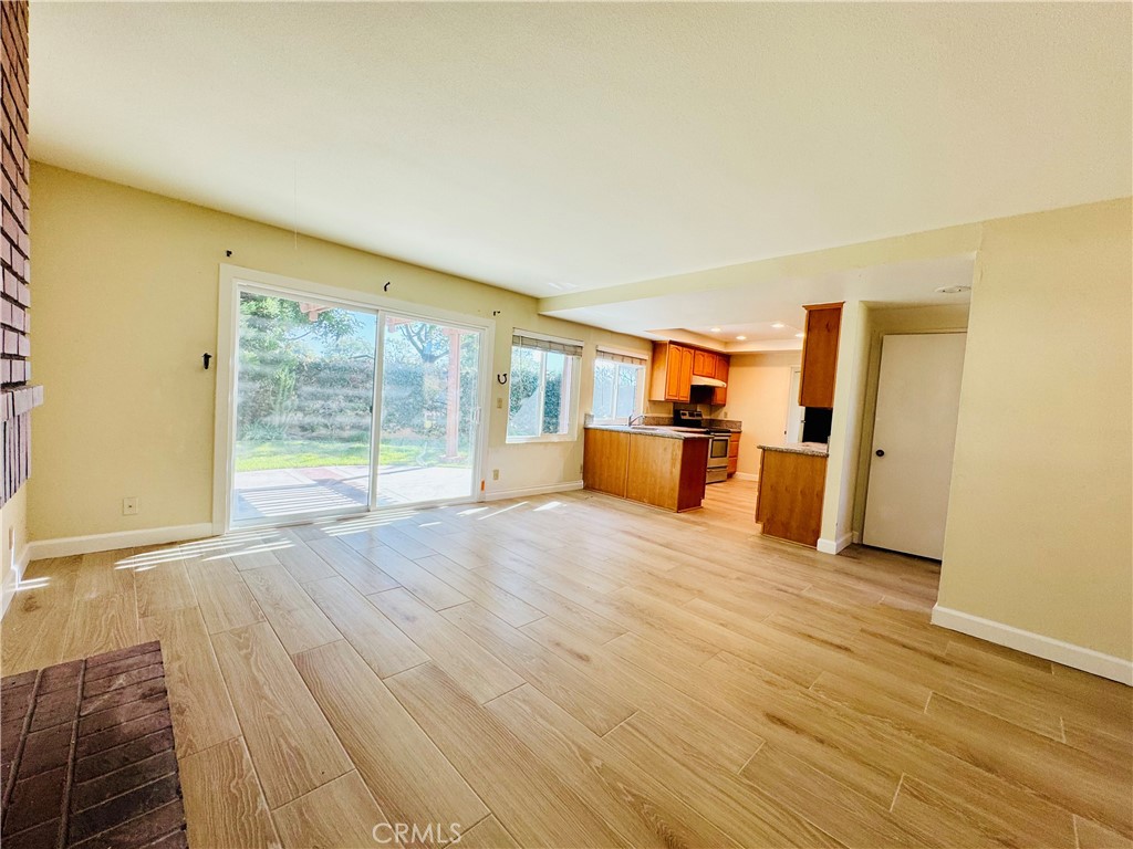 10 Coldbrook Irvine, CA 92604 - Photo 11 of 21 a view of empty room with wooden floor and fan