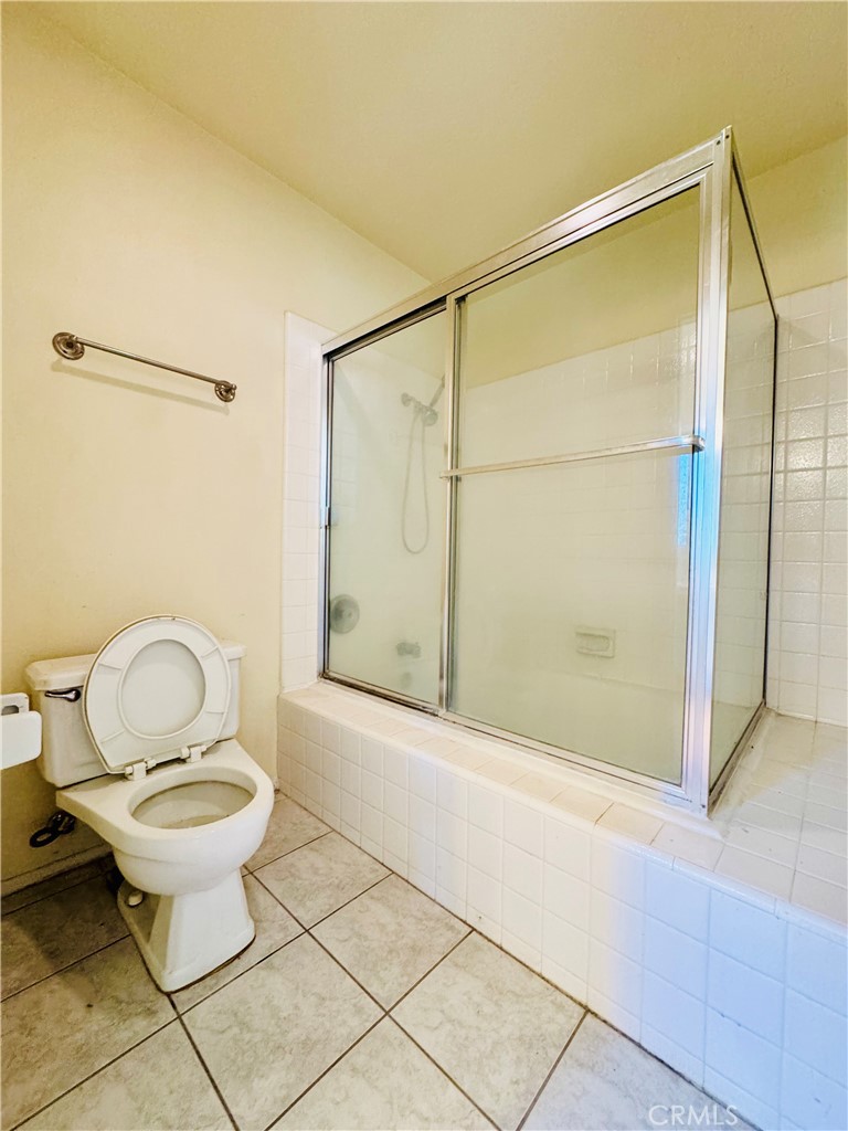 10 Coldbrook Irvine, CA 92604 - Photo 18 of 21 a bathroom with a toilet and a shower