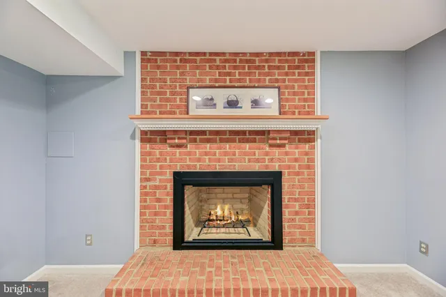 a kitchen with sink cabinets and wooden floor