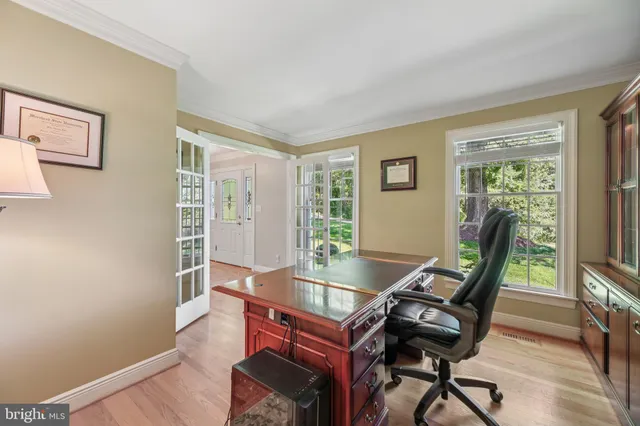 a workspace with furniture and rug