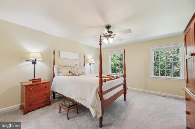 a front view of a house with a yard and porch