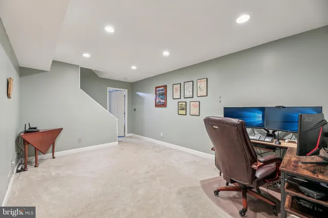 a view of a balcony with wooden floor and fence