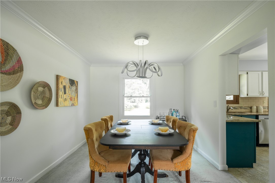 868 Trebisky Road Cleveland, OH 44121 - Photo 6 of 35 Dining Room with crown molding