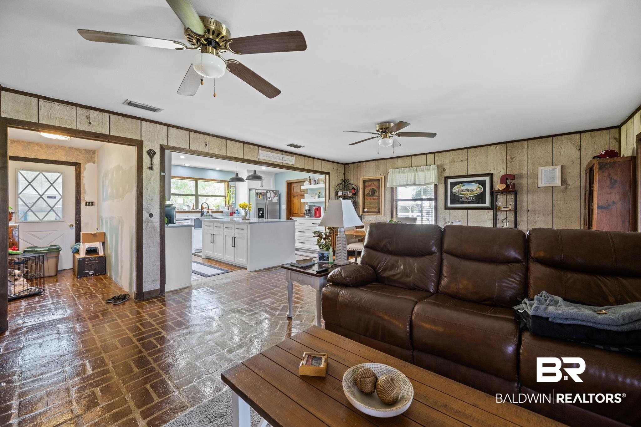 13643 County Road 3 Fairhope, AL 36532 - Photo 12 of 50 From sun room into living room and kitchen