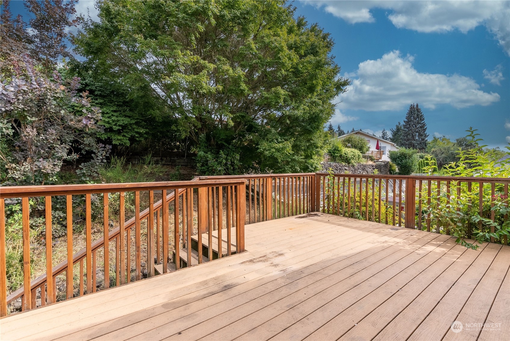 2650 Cherry Avenue Bremerton, WA 98310 - Photo 7 of 25 a balcony with trees in front of it
