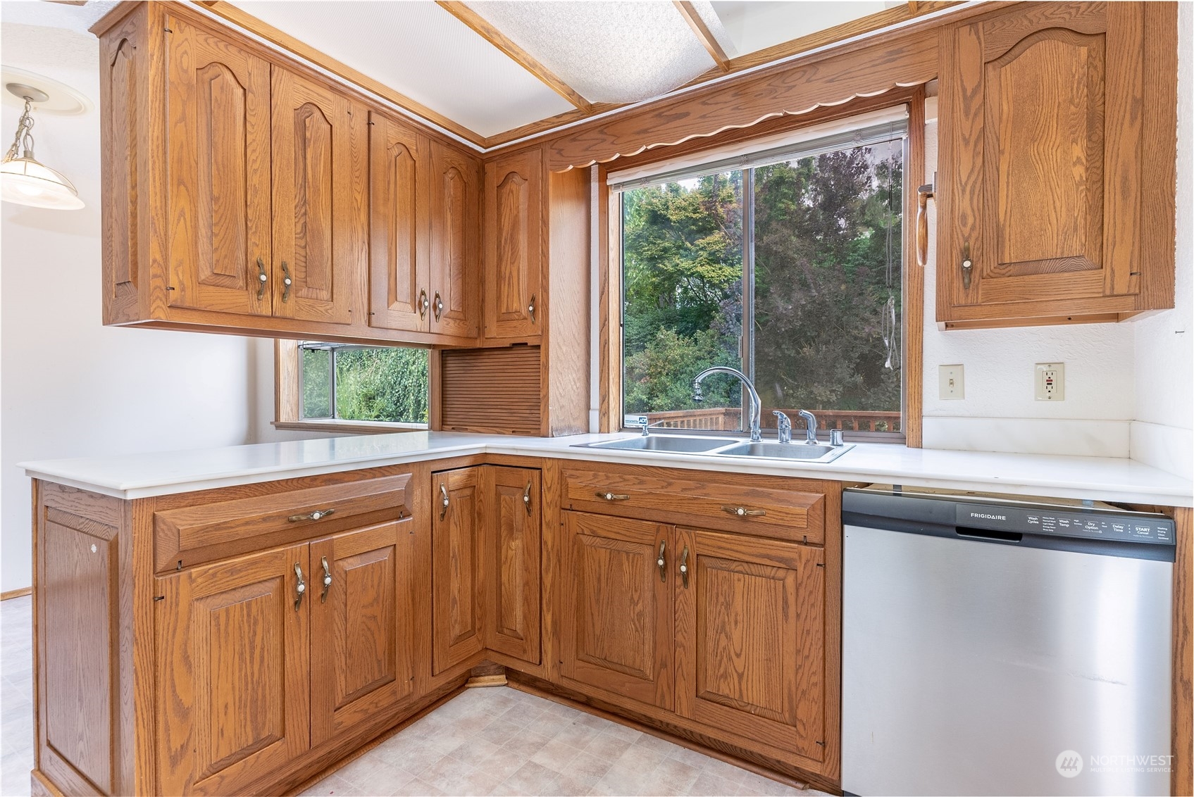 2650 Cherry Avenue Bremerton, WA 98310 - Photo 8 of 25 a kitchen with stainless steel appliances granite countertop a sink and cabinets
