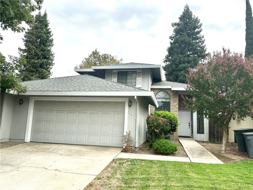 3072 Ironwood Court Merced, CA 95340 - Photo 2 of 25 a front view of a house with garden